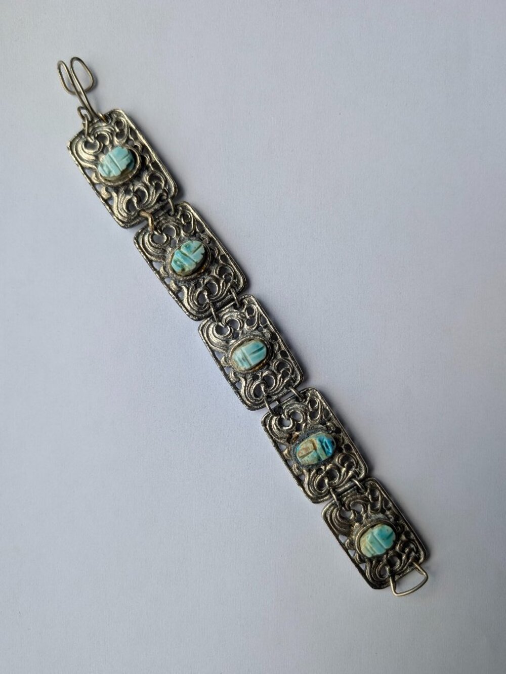 Wide silver and turquoise tone intricate heavy bracelet